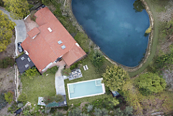 High-end real estate photography luxury home drone overhead view in Bel Air, CA. by Tom Hunter Photography